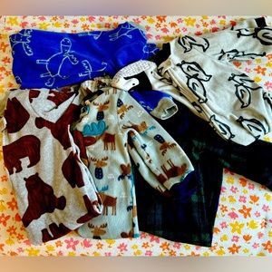 5 baby boy size 18 month pajamas. 1 Koala Kids, 1 BearPaw, and 3 Carter’s.